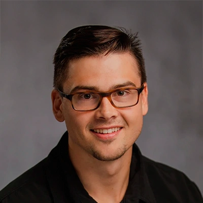 Professional headshot of a clinician