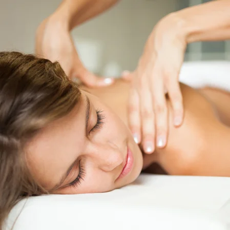 A woman receiving a massage.