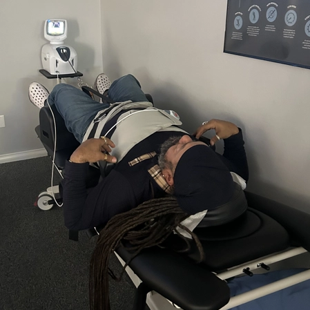 A person on a spinal decompression table.
